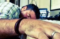 Sleeping man on work desk